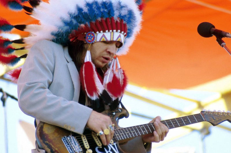 Stevie Ray Vaughan On Stage in Headdress